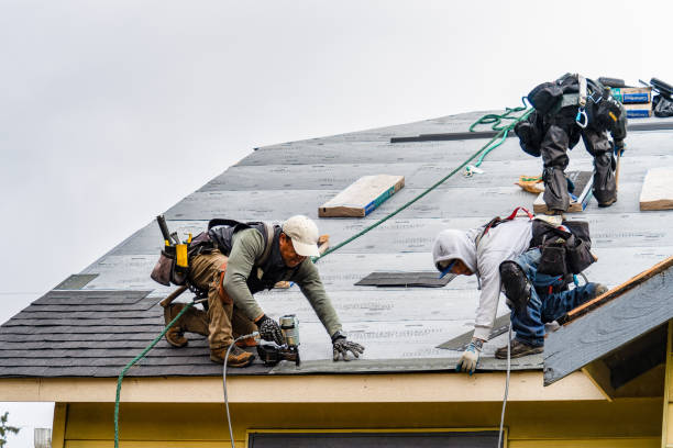 Professional Emergency Roof Repair technician working in Somersworth, NH